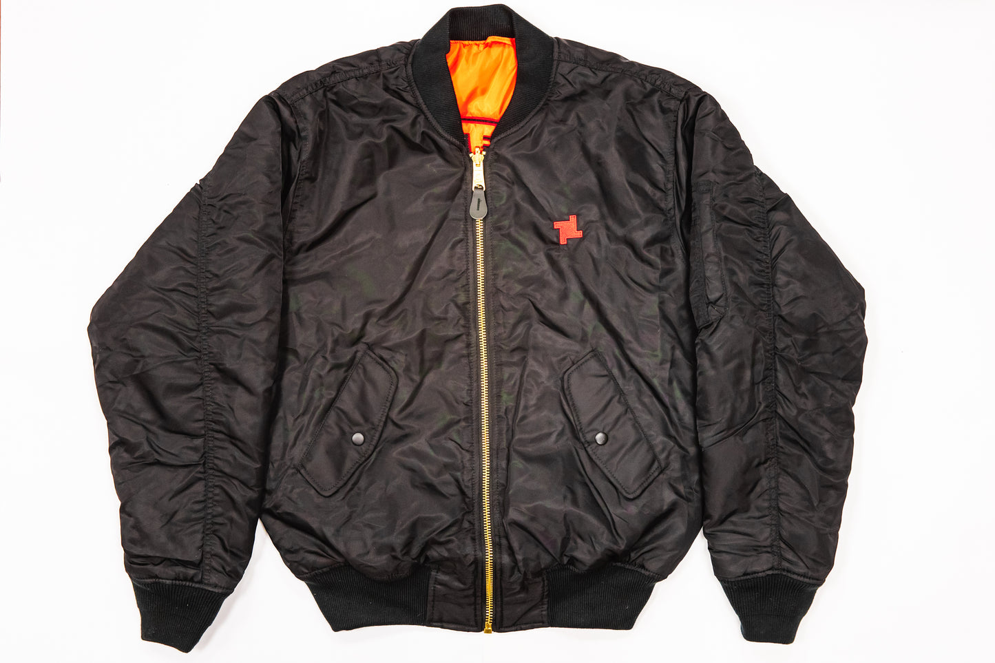 Limited Edition Never Not Making Noise Bomber Jacket in Black/Orange