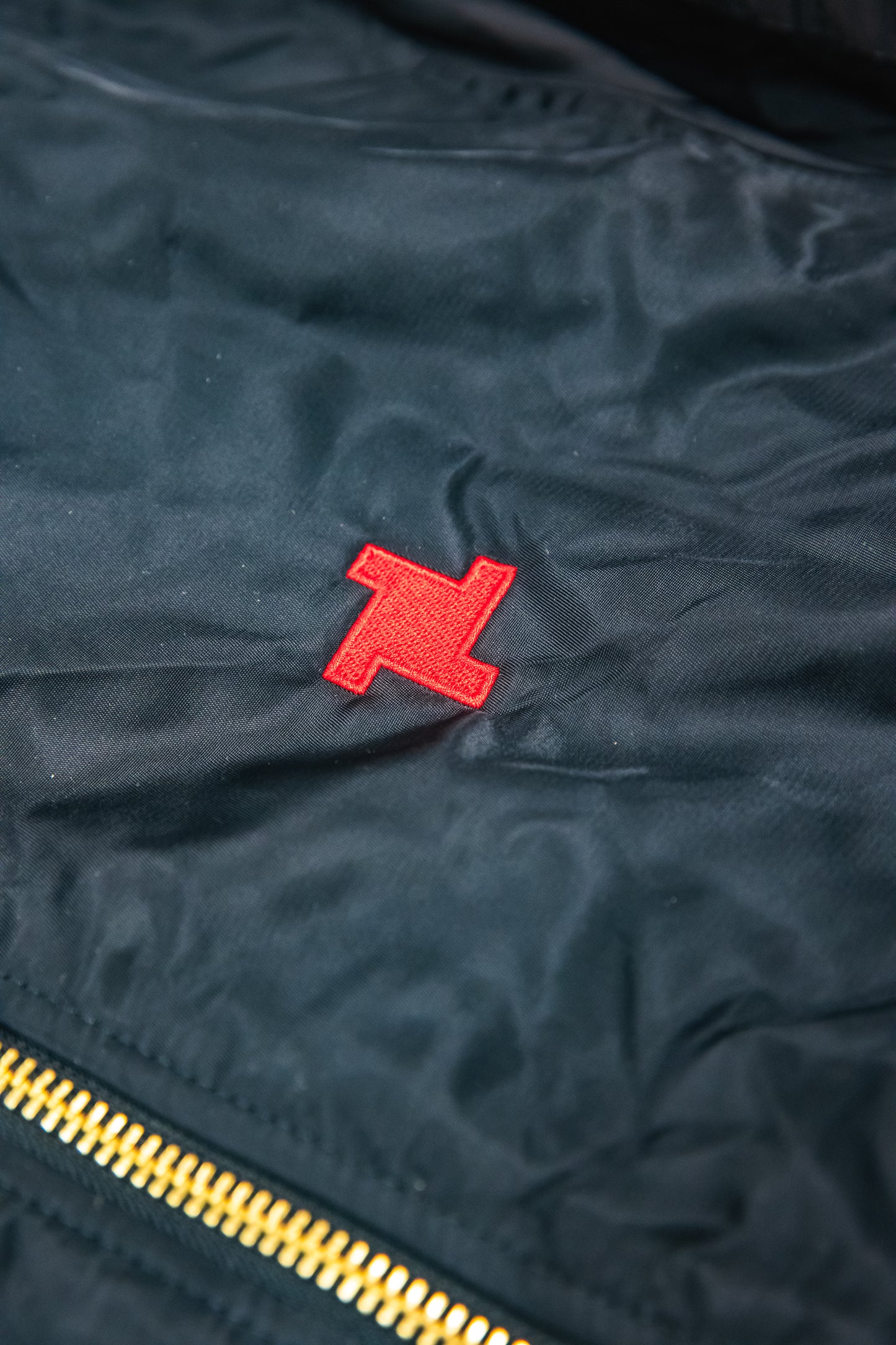 Limited Edition Never Not Making Noise Bomber Jacket in Black/Orange