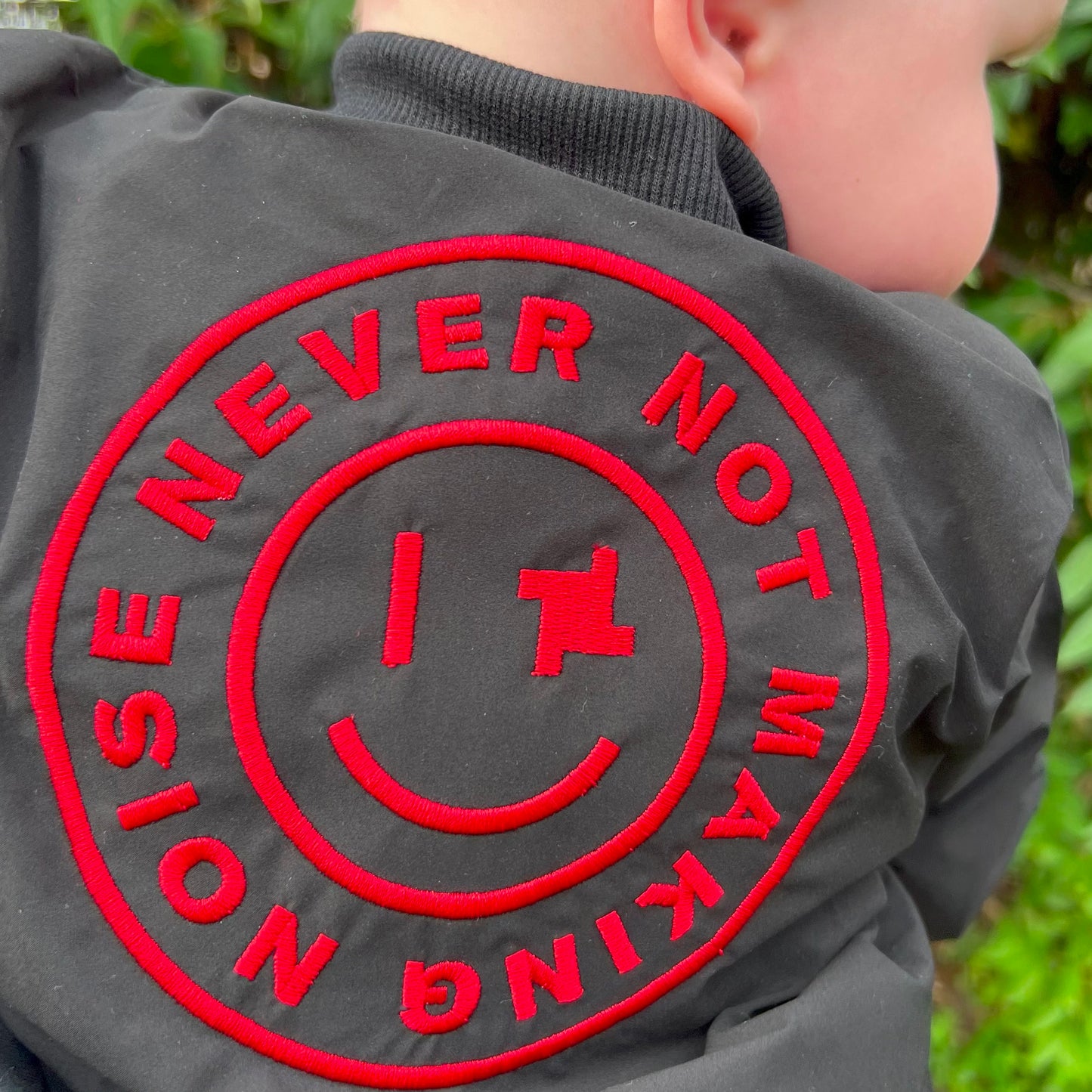 Baby Bomber Jacket - Limited Edition Never Not Making Noise in Black